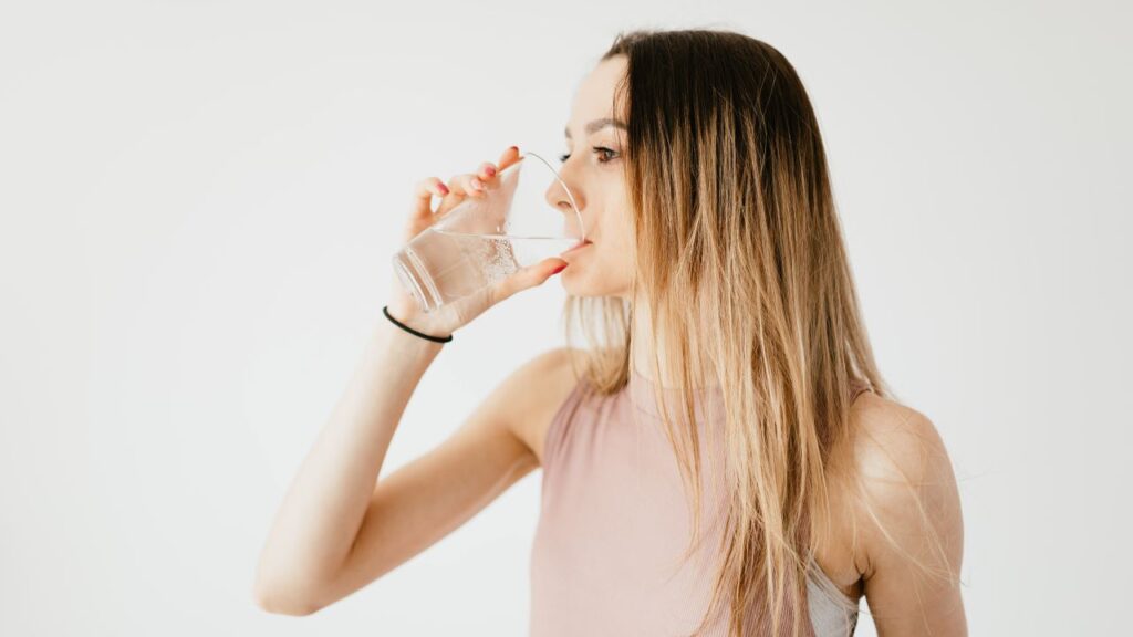 Girl Drinking Glass of Water